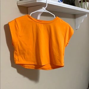 Small orange cropped workout tee